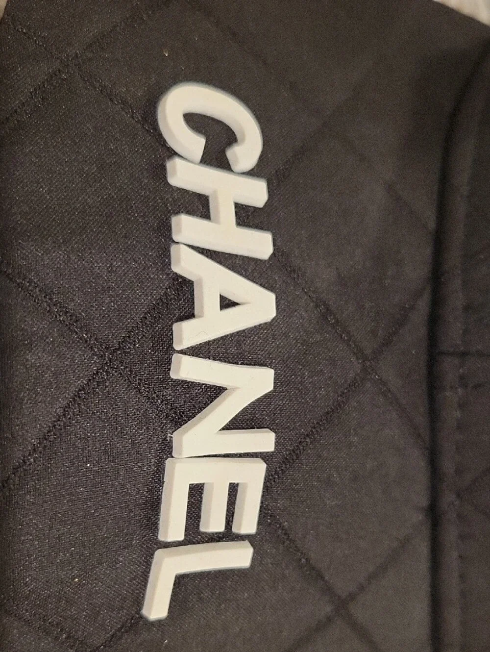CHANEL Black Cap with White CC Logo